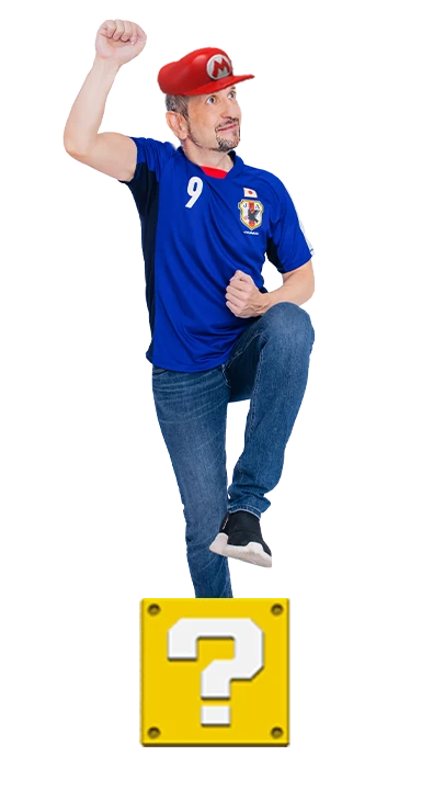 Mag. Bernhard Steger jubelt in Fußballpose mit erhobener Faust und energischem S